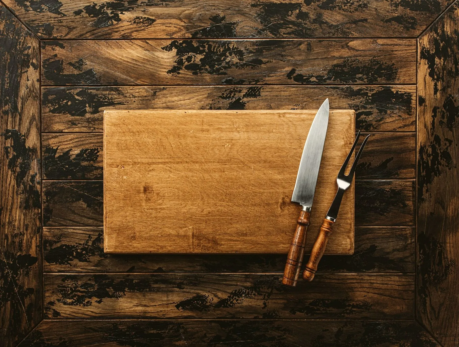 A butcher’s block and knives on the work counter at Perry Butcher Co.